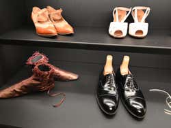 Vintage shoes on display at a museum in Warsaw